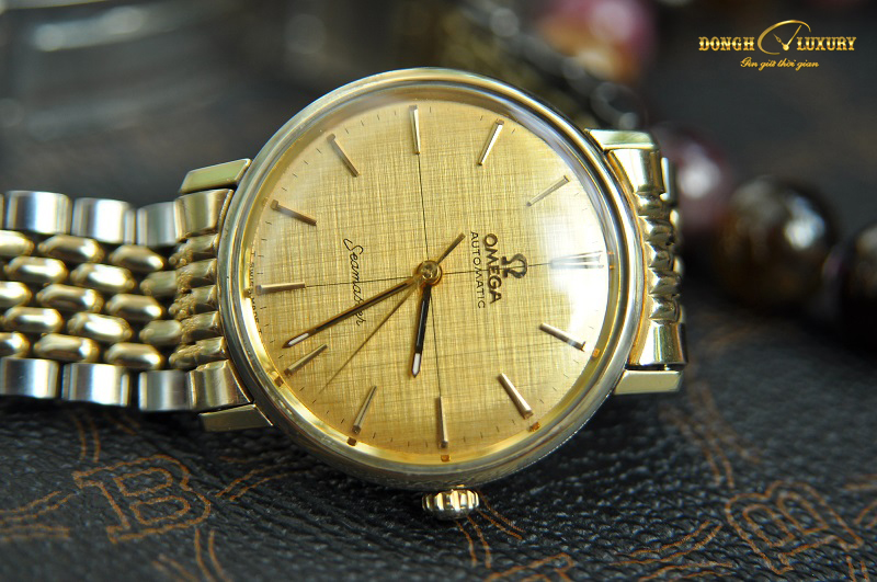 Đồng hồ Omega cổ vàng đúc 18k seamaster mặt phên lụa trục tung hoành Thụy Sỹ